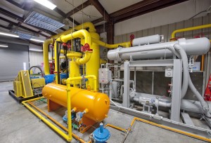 A compressor room, where the landfill gas is cleaned up and prepared before traveling to the engine.